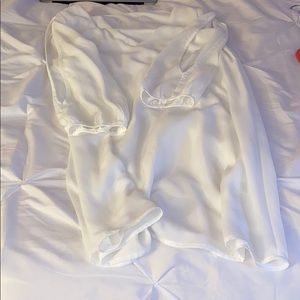 White dress with slits on sleeves